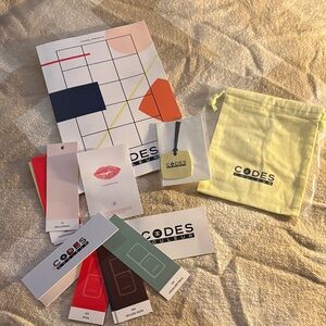 CHANEL Codes Couleur Set with Red and Yellow Accents